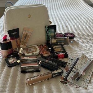 BAG 1 of 5 Guerlain makeup bag , lots of fun products. NWT